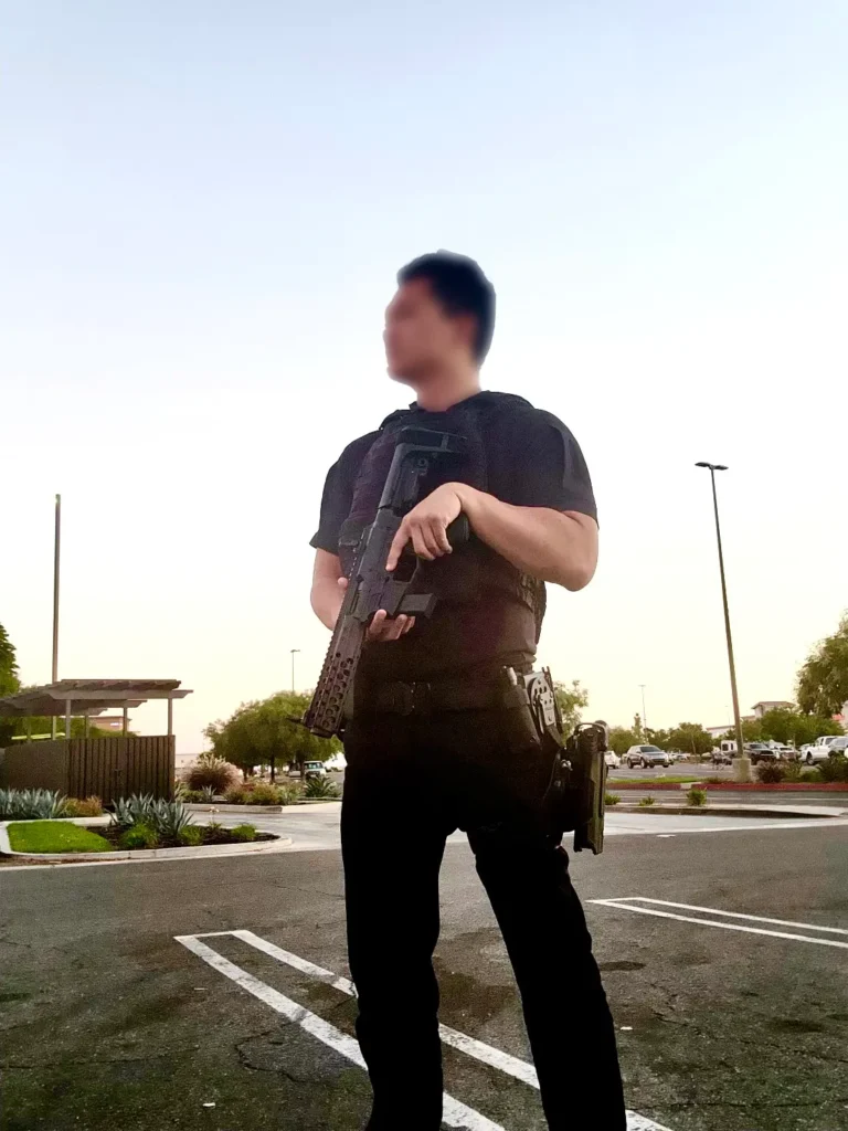 An armed person providing VIP protection