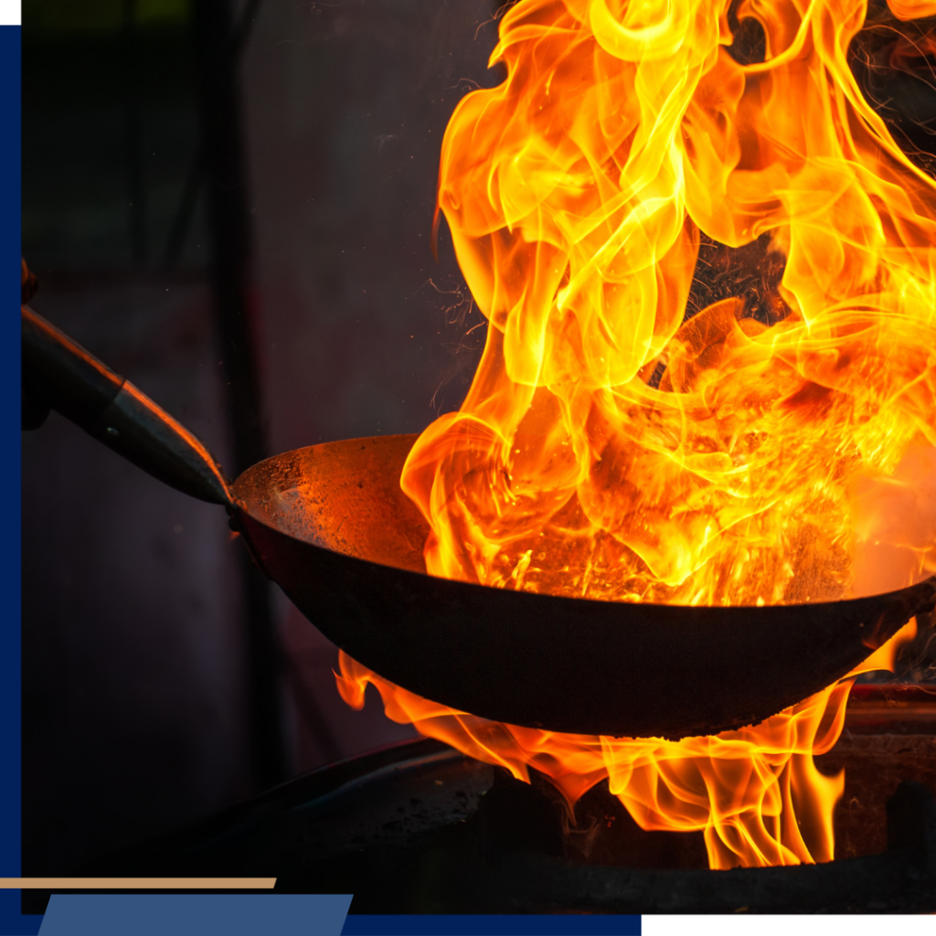 Chef cooking with fire