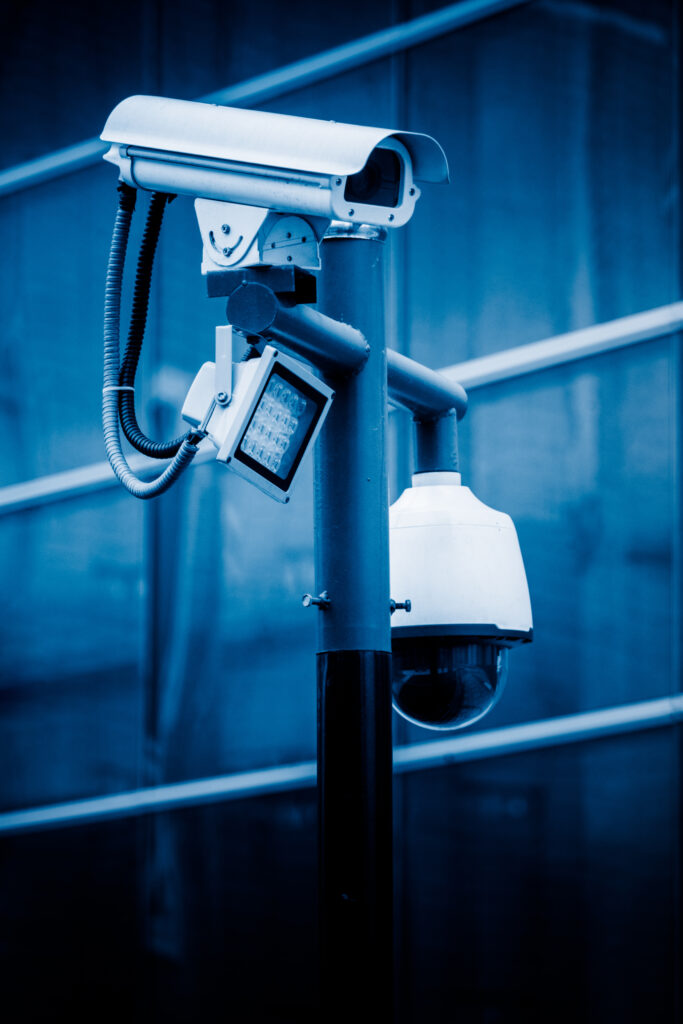 Cctv,Security,Camera,Against,Building,In,Blue,Tone.