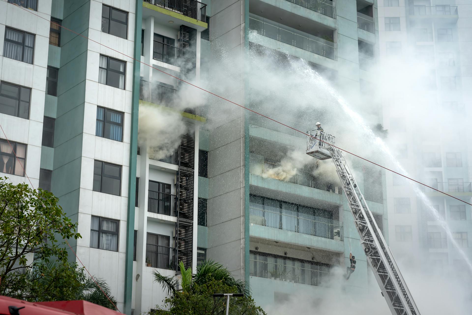 An office fire prevention team putting out flames